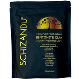Schizandu Bentonite Clay packaging with branding and product details on a black background
