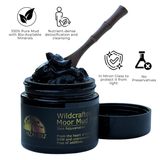 Wildcrafted Moor Mud Mask jar with wooden spoon on a white background, featuring Chizandu branding.