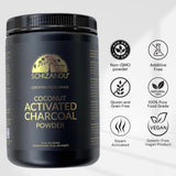Black container of Schizandu coconut activated charcoal powder with certification icons on a white background