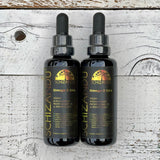 Two bottles of Schizandu Omega-3 DHA on a wooden surface