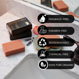 Schizandu soap bars with packaging on a marble surface, featuring icons and text about product features.