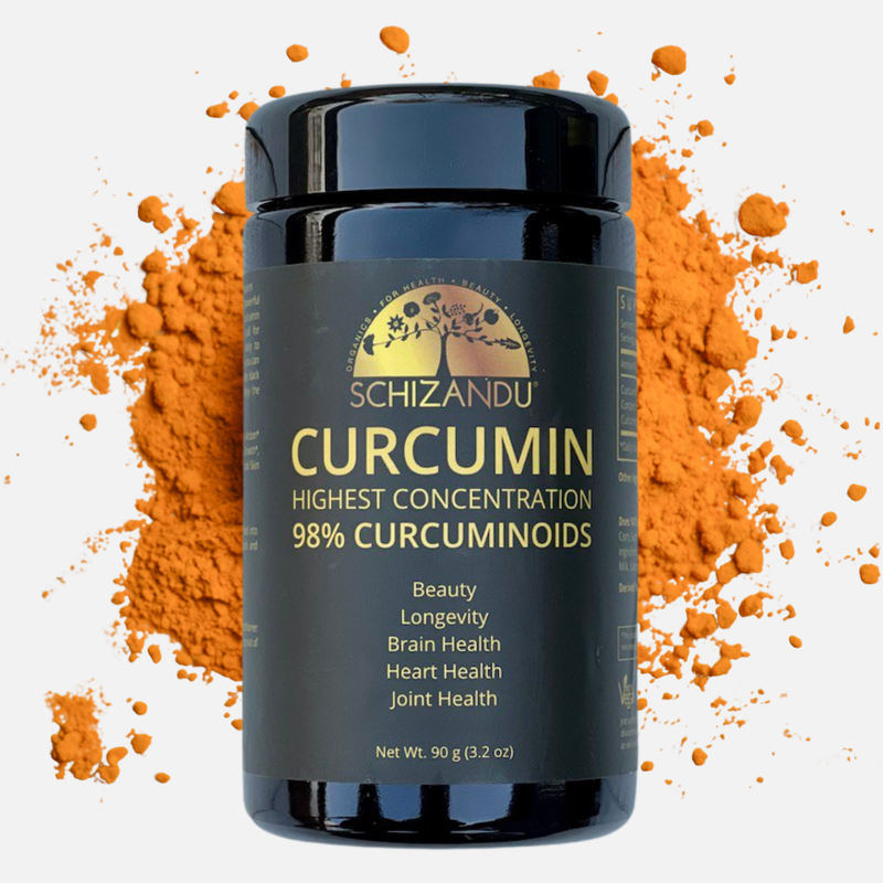 Schizandu Curcumin supplement container with orange powder on a white background