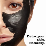 Person with black facial mask applied, text 'Detox your skin, Naturally.'