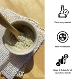 Bowl of powder with a wooden spoon on a checkered cloth, next to icons and text about product testing and packaging.