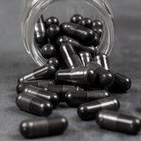 Activated charcoal capsule, food grade black carbon supplement used for digestive detox, toxin binding, and gut support
