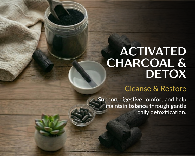 Activated charcoal on a wooden surface with text about detox and cleanse.