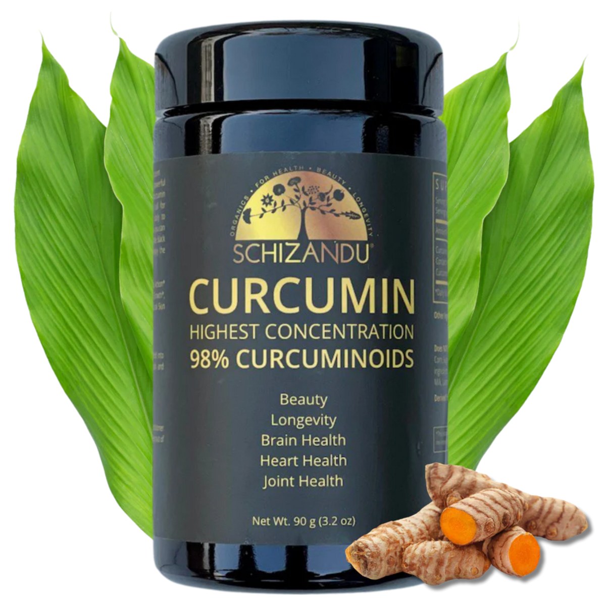 A black plastic bottle of Schizandu Curcumin with a black label and gold text, flanked by green turmeric leaves on the left and fresh turmeric root pieces on the right, against a solid white background.